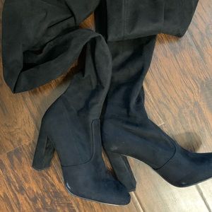 Over the knew black Steve Madden boots